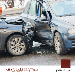 Two damaged cars involved in a Portland, ME t-bone accident