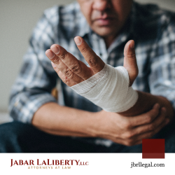 Personal injury victim holding bandaged hand